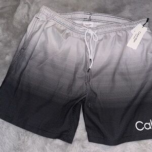 New CALVIN KLEIN SWIM
Logo Gradient Stripe Swim Trunks XXL​
